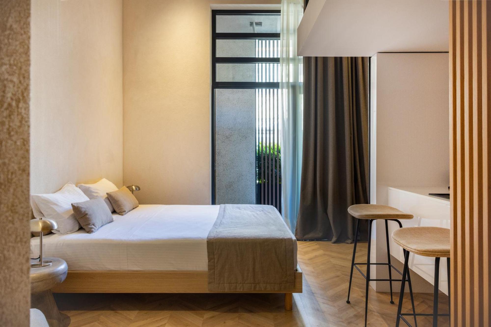 Отель The Newel Psychiko Афины Экстерьер фото A room at the hotel